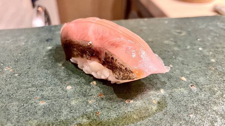 Sushi Kaneyoshi signature dishes The restaurant serves a multi-course omakase menu that changes daily based on fish availability from Japan.